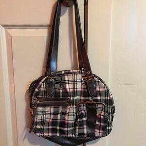 Super cute black, white, and purple purse